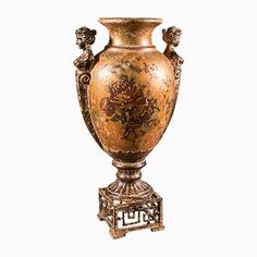 an ornate vase is on display against a white background