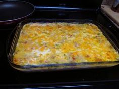 a casserole dish sitting on top of a stove