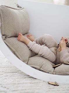 "KAURA cushion has been designed to be used with the LUOTO climbing arch when the arch is turned upside down and used as a rocker. The cushion is soft and puffy, so it makes rocking a comfortable and calming experience. The cushion has six cells filled with soft, 100 % recycled EcoSuperSoft filling to maximize comfort. In each corner of the cushion, there are ties to attach the cushion to the arch, so it won't slip out of the arch when you're getting onto it.  KAURA cushion is made of 100 % recy Montessori Climbing, Big Stuffed Animal, Climbing Arch, Play Fort, Kids Activity Table, Confidence Kids, Small Stool, Baby Gym, The Arch