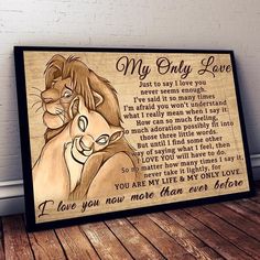 a wooden sign with the words i love you the most and an image of a lion hugging