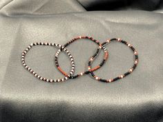 Set of 3 dainty seed bead bracelets. They look so cute when worn together or on their own! Very comfortable to wear. The perfect accessory to accent any fall or winter outfit! These are perfect for anyone! Style looks great on both boys and girls and all adults.  7" size made with seed beads and stretch cord. One size fits most. Stretchy Beaded Bracelet, Style Looks, Bead Bracelets, Seed Bead Bracelets, Winter Outfit, Bead Bracelet, Seed Bead, Seed Beads, Looks Great