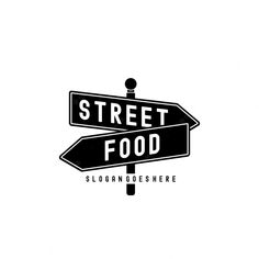 two street signs pointing in opposite directions with the words street food written below one sign