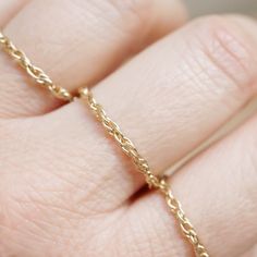 Journey Rings - 14k Gold Filled Flexible and fluid, our dainty chain rings are a customer favorite. These beauties add texture to your stack and are sturdy enough to withstand your daily activities!  Approximately 2mm thick, wear them solo or stacked. Okay to wash your hands with them! I'm happy to exchange if you need a different ring size. Modern Twist 14k Gold Midi Rings, 14k Gold-filled Chain Ring As A Gift, 14k Gold Filled Chain Ring As Gift, Dainty Yellow Gold Tarnish Resistant Chain Ring, Dainty Tarnish Resistant Yellow Gold Chain Ring, Gold Chain Ring With Delicate Chain For Gift, Gold Delicate Chain Ring, Delicate Gold Chain Ring Gift, Dainty Gold Chain Ring With Delicate Detail