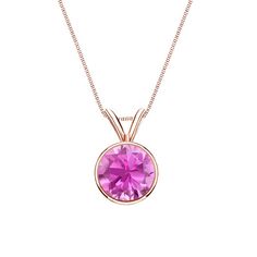 This stunning solitaire pendant necklace feature a Bezel setting in a glistening 14k rose gold metal. The pendant include dazzling Pink sapphire round-cut gemstone with a total weight of 1.00 ct. The pendant comes with a matching 18-inch box chain that secures with a spring ring clasp. Black Diamond Pendant, Pink Sapphire Pendant, Black Diamond Studs, Halo Diamond Earrings, Solitaire Diamond Pendant, Colored Diamond Rings, Solitaire Pendant Necklace, Halo Earrings, Black Diamond Ring