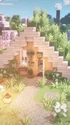 a house made out of blocks and plants