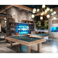 an indoor pool table in front of a tv