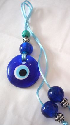 a blue evil eye glass bead necklace