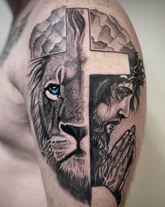 a man with a cross and lion tattoo on his arm