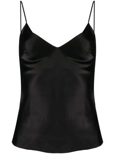 Black Sophia silk cami top from Gilda & Pearl featuring a v-neck, spaghetti straps and a straight hem. POSITIVELY CONSCIOUS: Gilda & Pearl scores 3 out 5 by independent ethical brand rating agency Good On You. It has a good animal rating and does not use fur, leather, wool, down, exotic animal skin or angora. It traces most of its supply chain manufactures locally to reduce its carbon footprint. Black Going Out Tops, Black Silk Top, Dr Wardrobe, Silk Cami Top, Blusas Top, Fancy Fits, Silk Tops, Black Cami Top, Black Cami