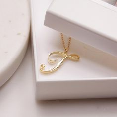 "T Initial Necklace - Cursive \"T\" initial - Gold necklace for women - Gold chain - Classic gold necklace - Gold jewelry for her, for mom Dainty \"T\" initial. Perfect every day necklace. Lovely gift for your self, sister, bridesmaids, new mom. Convo me if you would like to customize the length of the chain. The possibilities are endless. Pendant: Base metal is brass and 16K gold plated. Chain is 18 inches, 14k gold filled. (if you would like a longer or shorter chain, please contact us to cust T Cursive, T Initial Necklace, Cursive T, Every Day Necklace, T Initial, Gold Necklace For Women, Word Necklace, Alphabet Necklace, Christmas Party Gift