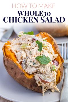 a close up of a baked potato with chicken salad on it