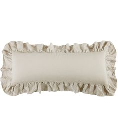 a white pillow with ruffled edges