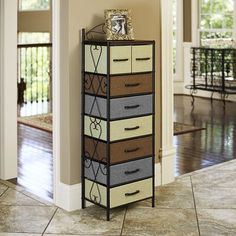 a tall cabinet with five drawers in a living room next to an open door that says click here