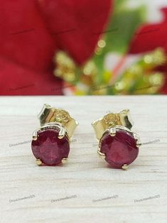 ------------------------------------------ Welcome to Our Shop DivyaJewellers925 ------------------------------------------ "Valuable Ruby Stud Earrings, Gemstone Earrings, Red Stud Earrings, 18k Yellow Gold Jewelry, Wedding Gift, Earrings For Brides Maid" Description :- SKU:- JD749 Metal:-  Yellow Gold Metal Purity:- 18k Gemstone:- Ruby Gemstone Color:- Red Gemstone Shape :- Round Gemstone Creation :- Natural About DivyaJewellers925: A Legacy of Craftsmanship DivyaJewellers925 stands as a disti Ruby Earrings In Yellow Gold For Gift, Ruby Yellow Gold Earrings For Gift, Yellow Gold Ruby Earrings For Gift, Red Prong Set Earrings For Valentine's Day, Ruby Earrings For Valentine's Day, Red Prong-set Earrings For Valentine's Day, Valentine's Day Red Earrings With Prong Setting, Hallmarked Ruby Earrings For Anniversary, Formal Red Round Bridal Earrings