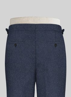 A genuine sartorial masterpiece, the Playman Blue Denim Highland Tweed Trousers stand out in the best way possible with its luxurious feel and solid flair. Crafted from wool, the sumptuous trousers will wow the crowd at off-duty weddings and party events. 
 
 Look Includes  Playman Blue Denim Tweed Fabric  Cross Pocket  Forward 2 Pleats  Side Tabs (No Loops)- Arrow Shape   Bottom Cuff (1.5")  Two Welted Back Pockets on Trousers   You can change the look during customization if required. 
 
 Lini Grey Tweed Suit, Herringbone Tweed Jacket, White Linen Suit, Green Velvet Jacket, Peaky Blinders Suit, Country Gentleman, Royal Blue Suit, Fabric Cross, Tweed Trousers