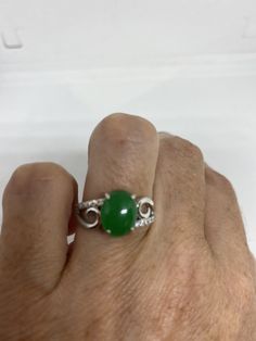 Vintage green nephrite jade Ornate German Silver ring, does not tarnish, NOT sterling Sizes 7, 8 or 9 All rings are shipped in a nice gift box. Check out our over a THOUSAND great reviews Engraving is $4 per letter and is not always perfect depending on the piece. It can take a few days if the jeweler is busy. This is payable to Paypal Judithsltd@gmail.com Classic Green Jade Rings, Green Jade Promise Ring, Green Jade Rings For Promise, Jade Ring For Anniversary, May Birthstone, Classic Silver Jade Ring, Classic Silver Ring With Jade, Green Cabochon Ring For Anniversary, Silver Jade Rings For Formal Occasions, Silver Jade Rings For Anniversary