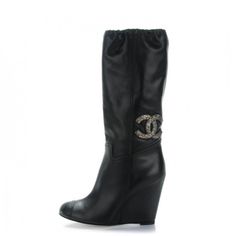 Chanel Cc Crystal Embellished Black Leather Wedge Heel Calf Boots In Excellent Condition Size 37 Soft Lamb Leather These Chic Boots Are Crafted Of Lambskin Leather In Black. They Feature A 4 Inch Heel, A Rounded Toe And A Beaded Cc Embellishment. Enjoy These Stylish Boots For A One Of A Kind Look From Chanel! Chanel Wedges, Chic Boots, Chanel Boots, Black Leather Wedges, Stylish Boots, 4 Inch Heels, Calf Boots, Chanel Shoes, Fashion Killa