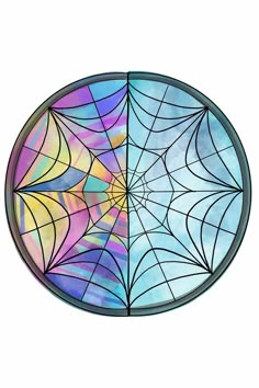 two circular stained glass windows with different shapes and colors, one in the shape of a spider's web