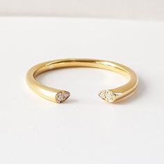 "★ ★ ★ Made with solid gold to ensure the strength of the ring.★ ★ ★ This diamond cuff ring, part of our \"Minimal Collection\" is a delicate, fashion piece to wear as well as an index ring or knuckle ring. Use as a standalone piece or with stacking rings. Item Details ❤ Made to Order ✔ Available Gold Color: Rose Gold, Yellow Gold, White Gold, ✔ Number of Diamonds: 4, total carat weight: 0.03Ctw, ✔ Diamond Color: G Color ✔ Diamond Clarity: VS ✔ Band details: Top Width: 2.4mm Thickness: 3.0mm Bot Adjustable Vvs Clarity Open Diamond Ring, Adjustable Open Ring With Single Cut Diamonds, Open Ring With Single Diamond, Adjustable Open Band Diamond Ring For Promise, Adjustable Promise Rings With Single Cut Diamonds, Adjustable Open Band Diamond Ring, Adjustable Single Diamond Open Ring, Promise Stackable Rings With Open Band, Adjustable Yellow Gold Open Diamond Ring