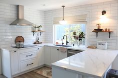 the kitchen is clean and ready for us to use in its new owner's home