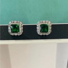 New! Sold Out! Stunning Emerald Earrings. 14k White Gold Finish. Quality Jewellery. Emerald Cut Stone. Made In Italy, Luxury Backing Stud Earrings. Retail Price: $950.00 Bergdorf Goodman Retail: $950.00 Dress Like A Royal Duchess! Luxury Green Sterling Silver Diamond Earrings, Green Sterling Silver Luxury Diamond Earrings, Classic Emerald Earrings For Formal Occasions, Luxury Green Diamond Earrings In Sterling Silver, Classic Formal Emerald Earrings, Formal Emerald Jewelry With Halo Design, Formal Emerald Diamond Earrings For May Birthstone, Luxury May Birthstone Earrings For Formal Occasions, Elegant Emerald Earrings For Anniversary