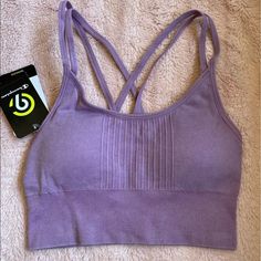 Champion Strappy Back Seamless Sports Bra. Nwt. Size Xs (Fits Cup Sizes 30 A,B And 32 A) Duo Dry, Moisture Wicking Removable Cups Purple, The Color Is Called “Mauve Mist” I Ship Daily M-F. If Purchase Is Made After 4pm Est It Will Ship The Next Day. Sports Bra With Seamless Design, Purple Seamless Tops For Gym, Workout Bra With Light Support And Seamless Fabric, Casual Light Support Bra For Workout, Seamless Sports Bra For Light Exercise, Casual Workout Bra With Light Support, Workout Bra With Light Support In Seamless Fabric, Seamless Casual Crop Top For Light Exercise, Seamless Medium Support Sleeveless Bra