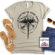 "Embrace the Beauty of the Unexpected with our 'Always Take the Scenic Route' T-shirt! 🌄👕 This shirt is a reminder to embrace life's adventures, to savor the journey, and to find joy in the unexpected detours. Whether you're a nature lover, a wanderer, or simply appreciate the scenic view, this tee is a perfect companion. Wear it proudly and let the world know you're all about the scenic route, where every twist and turn holds a new discovery. A fantastic gift for fellow explorers or a wonderf Always Take The Scenic Route, Outdoor Shirts, Painted Clothing, Screen Print Transfer, Travel Shirt, Leopard Print Shirt, Print Transfer, Scenic Routes, Black Screen