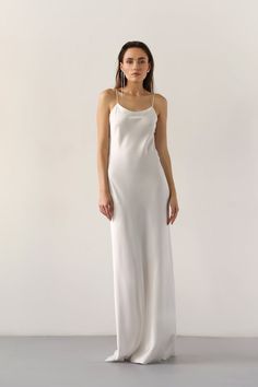 White Satin Finish Dress With Spaghetti Straps, White Satin Finish Slip Dress For Evening, White Satin Dress With Bias Cut, White Silk Slip Dress For Wedding Night, White Satin Slip Dress For Wedding Night, White Satin Bias Cut Dress, White Satin Slip Dress With Spaghetti Straps, White Slip Dress With Satin Finish And Spaghetti Straps, Bias Cut Floor-length Gown For Wedding Night