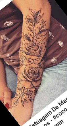 a woman's arm with flowers on it and the words tattooem de marro