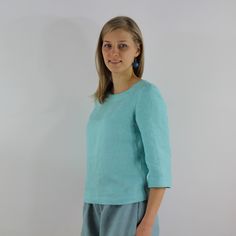 "Handmade turquoise linen blouse with long sleeves, perfect for casual wear and suitable for any occasion in any season Details: - 100% natural linen produced in Europe ; - medium weight (180 gram per square meter); - color: turquoise, can be any from our colors catalog (color samples at the photo); Made to order, approximately a few days, If you have any questions please message me and I will be glad to answer. Size guide : Size XS Bust: fits bust around 33\"-34\"/ 84-88 cm Waist: fits waist ar Light Blue Relaxed Fit Linen Tops, Relaxed Fit Light Blue Linen Tops, Casual Long Sleeve Turquoise Blouse, Casual Turquoise Long Sleeve Blouse, Linen Apron Pinafore, Linen Casual Dress, Blouse With Long Sleeves, Color Catalog, Blouse Summer