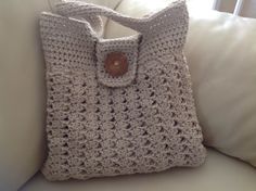 This beautiful purse crocheted with 85% cotton/15% polyester Measurements: Lined One zipper interior pocket 12" high, 16'' high with handles, 12" bottom wide, 10.5'' top wide Color Beige Front closure with wooden button CAME FROM A SMOKE FREE HOME Thank you for viewing my post 😊 Summer Beige Crochet Bag With Top Carry Handle, Cream Crochet Bag For Daily Use, Cream Crochet Bag For Everyday Use, Beige Crochet Bag For Everyday, Cream Crochet Rectangular Shoulder Bag, Daily Use Beige Crochet Bag, Handmade Cream Crochet Bag For Everyday, Handmade Cream Crochet Tote Bag, Beige Handheld Crochet Bag With Handles