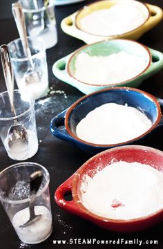 a table topped with plates and glasses filled with liquid