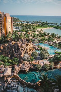 an aerial view of the resort and lagoons at disney's grand california hotel