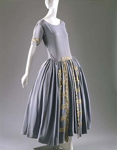 Robe de Style House of Lanvin  (French, founded 1889) Designer: Jeanne Lanvin (French, 1867–1946) Date: 1922 Culture: French Medium: silk, metal, glass Dimensions: Length at CB: 52 in. (132.1 cm) Credit Line: Gift of Mrs. Stephen C. Clark, 1962 Accession Number: C.I.62.8.5. Actually I think I love This Little Dress <3 House Of Worth, Madeleine Vionnet, Eastern Dresses, 20th Century Fashion, French Fashion Designers