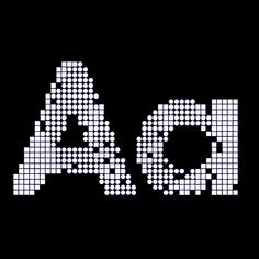 the word ao is made up of small dots and letters that appear to be pixeled