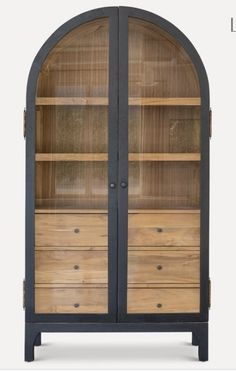 a wooden cabinet with glass doors and drawers on the bottom, in front of a white background