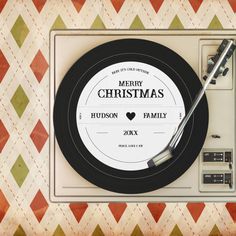 a record player with a merry christmas label on it