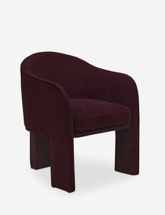 a purple chair sitting on top of a white floor