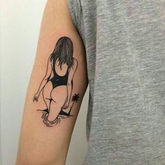 a person with a tattoo on their arm