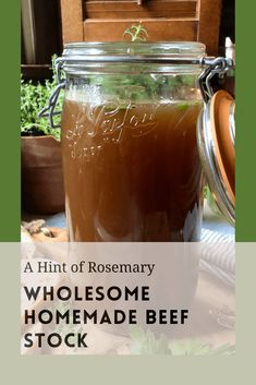 a glass jar filled with homemade beef stock