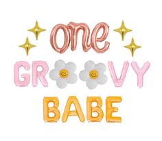 one groovy babe balloon with flowers and stars on the top, in pink and gold