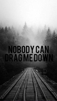 a train track with the words nobody can drag me down