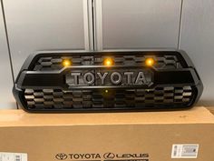 the toyota logo is on top of a box