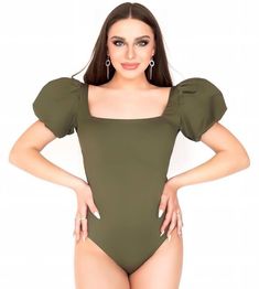 Swimsuit one piece green military colour sleeves flashlight fashion designer stretch fabric Individual Tailoring according hight and waist, size range from XS-6XL Green Stretch One-piece Bodysuit, Green High Stretch Swimwear For Summer, High Stretch Green Swimwear For Summer, Green Fitted Bodysuit For Swimming, Green Short Sleeve Swimwear With Stretch, Green Stretch One-piece For Summer, Green Fitted One-piece Bodysuit, Fitted Green One-piece Bodysuit, Fitted Olive Swimwear For Summer