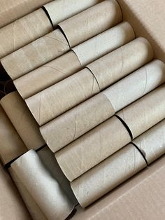 several rolls of toilet paper in a box