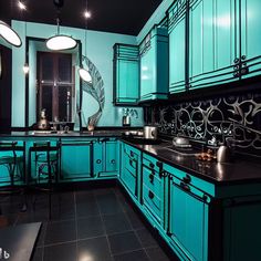 a kitchen with teal cabinets and black counter tops is lit by pendant lights that hang from the ceiling