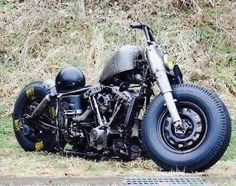 a motorcycle that is sitting in the grass