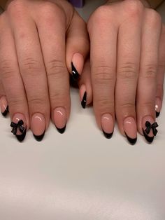 Black french nails with a black bow, almond shaped nails, bows, long nails, biab Black French Tip Nails With Letter, Almond French Tip Black Nails, Nail Designs Almond Shape Black, Almond Black Nails Ideas, Med Almond Nails Designs, Black French With Bow, Black Bows Nails, Nail Ideas Simple Black, Black Bow Nail Design