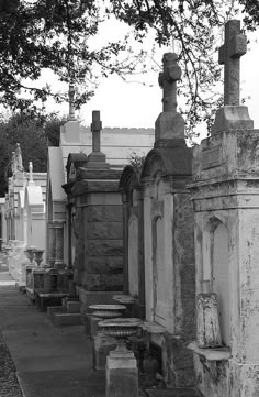 black and white photograph of old cemetery with headstones