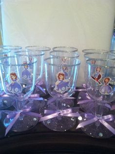 there are many glass cups that have princesses on them